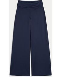 Hollister - Gilly Hicks Active Recharge Hose mit weitem Bein und Umschlagbund - Lyst