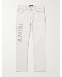 Amiri - Slim-Fit Straight-Leg Logo-Print Paint-Splattered Jeans - Lyst